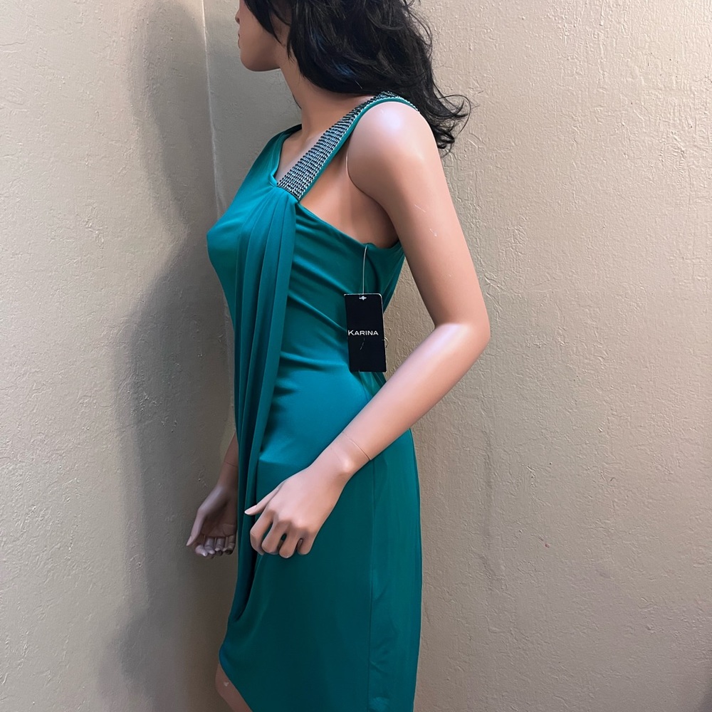 Karina - emerald mini dress with faux emerald green stones. Size 8.